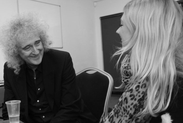 Journalist Bex Bastable interviewing Brian May